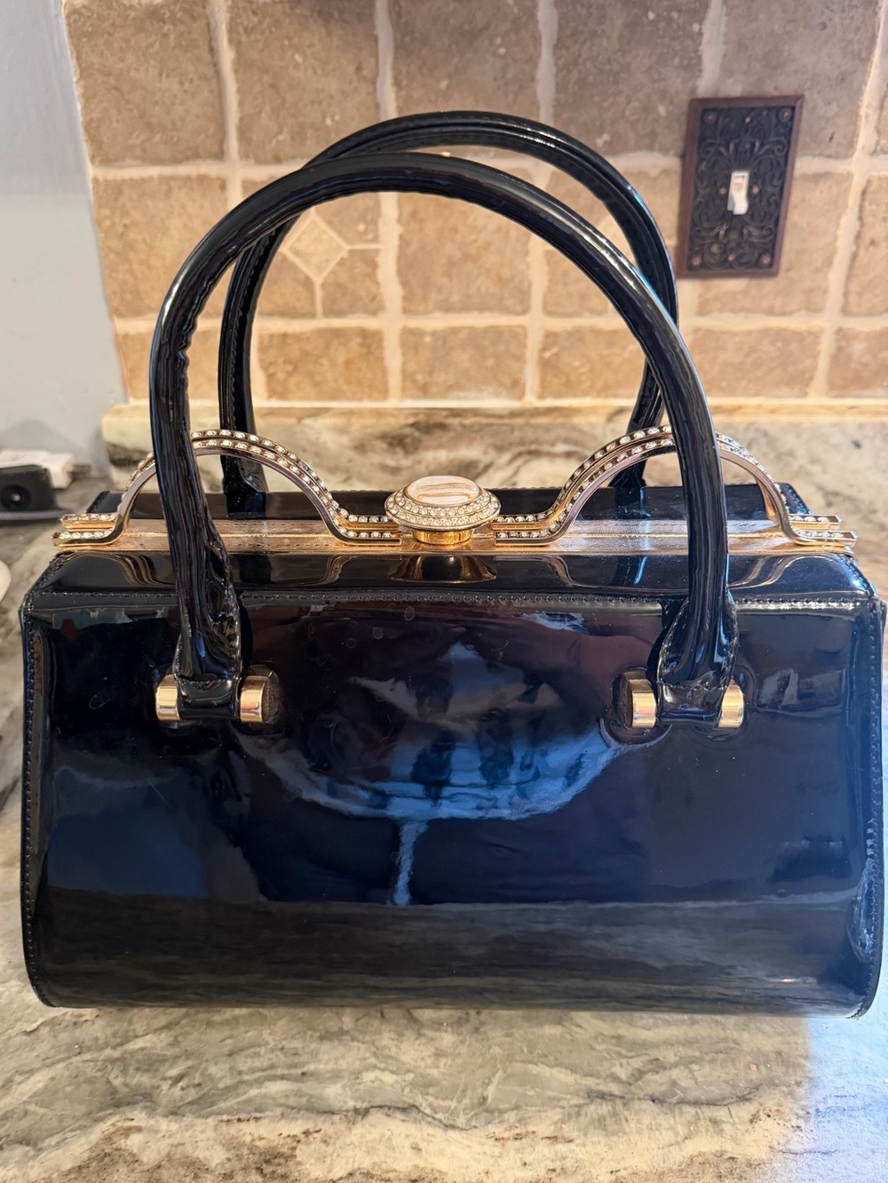 Black Patent Satchel Handbag with Gold Accents